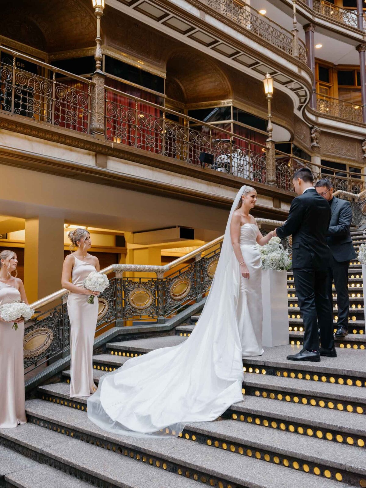 Wedding ceremony under glass ceiling at The Arcade Cleveland