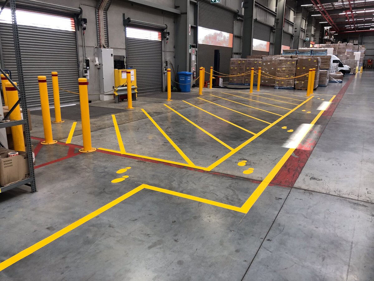 Industrial space with linemarkings for safety.