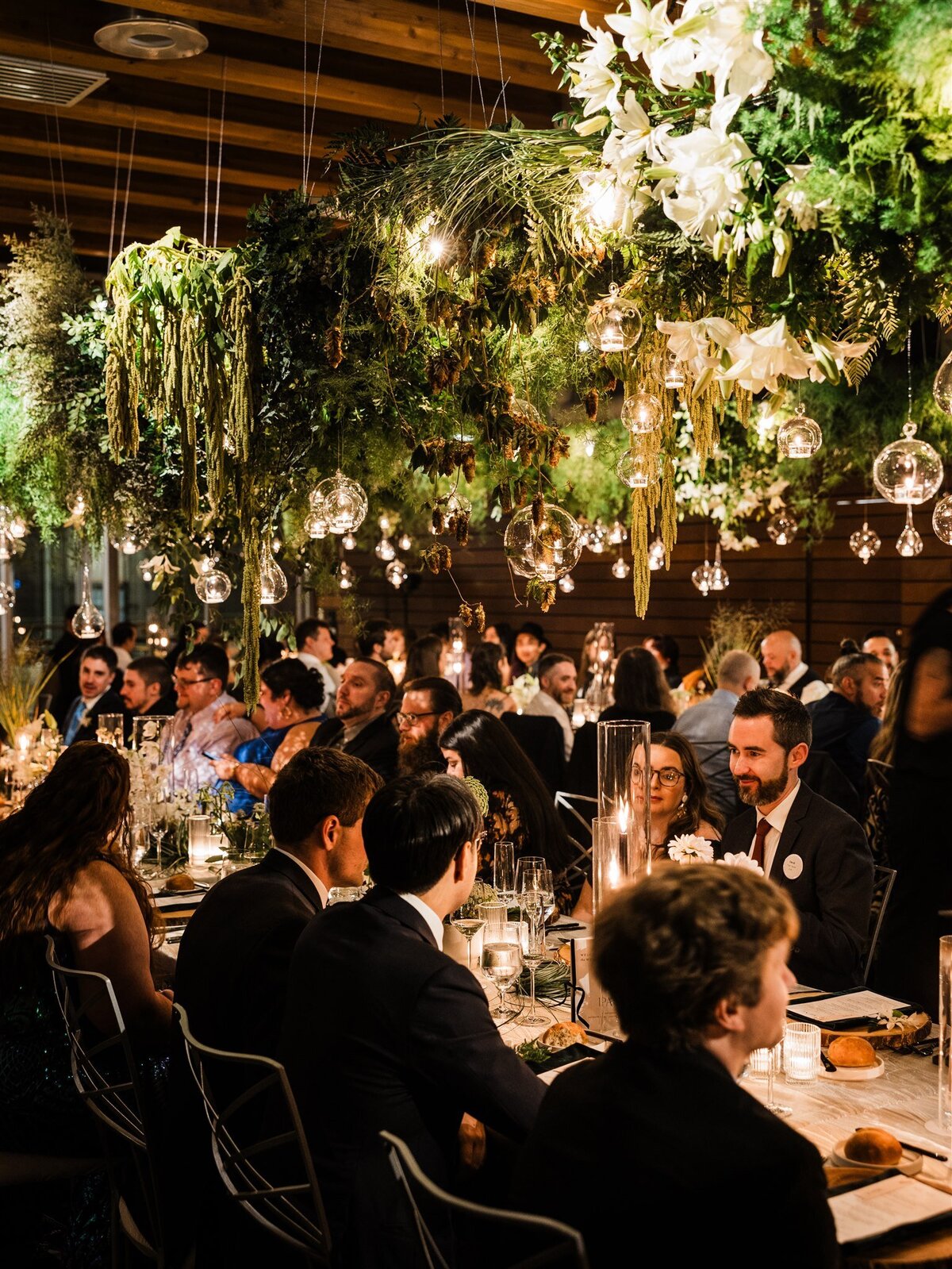 Dramatic-Ceiling-Greenery-Candle-Light-Wedding-Flora-Nova-Design-Seattle-00096