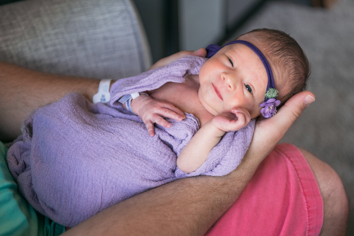 At home newborn session with lavender wrap in Massachusetts