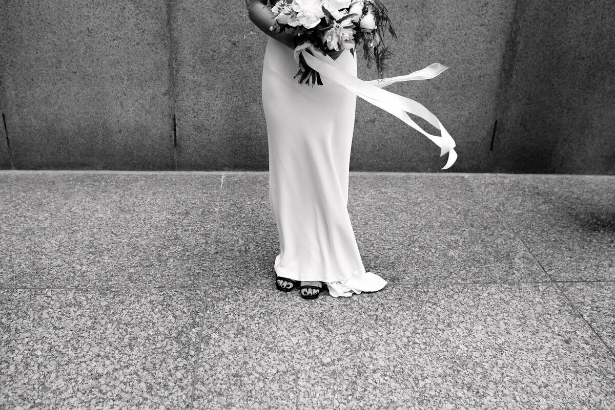 Editorial Candid moment of modern bride portraits downtown toronto financial district jacqueline james photography