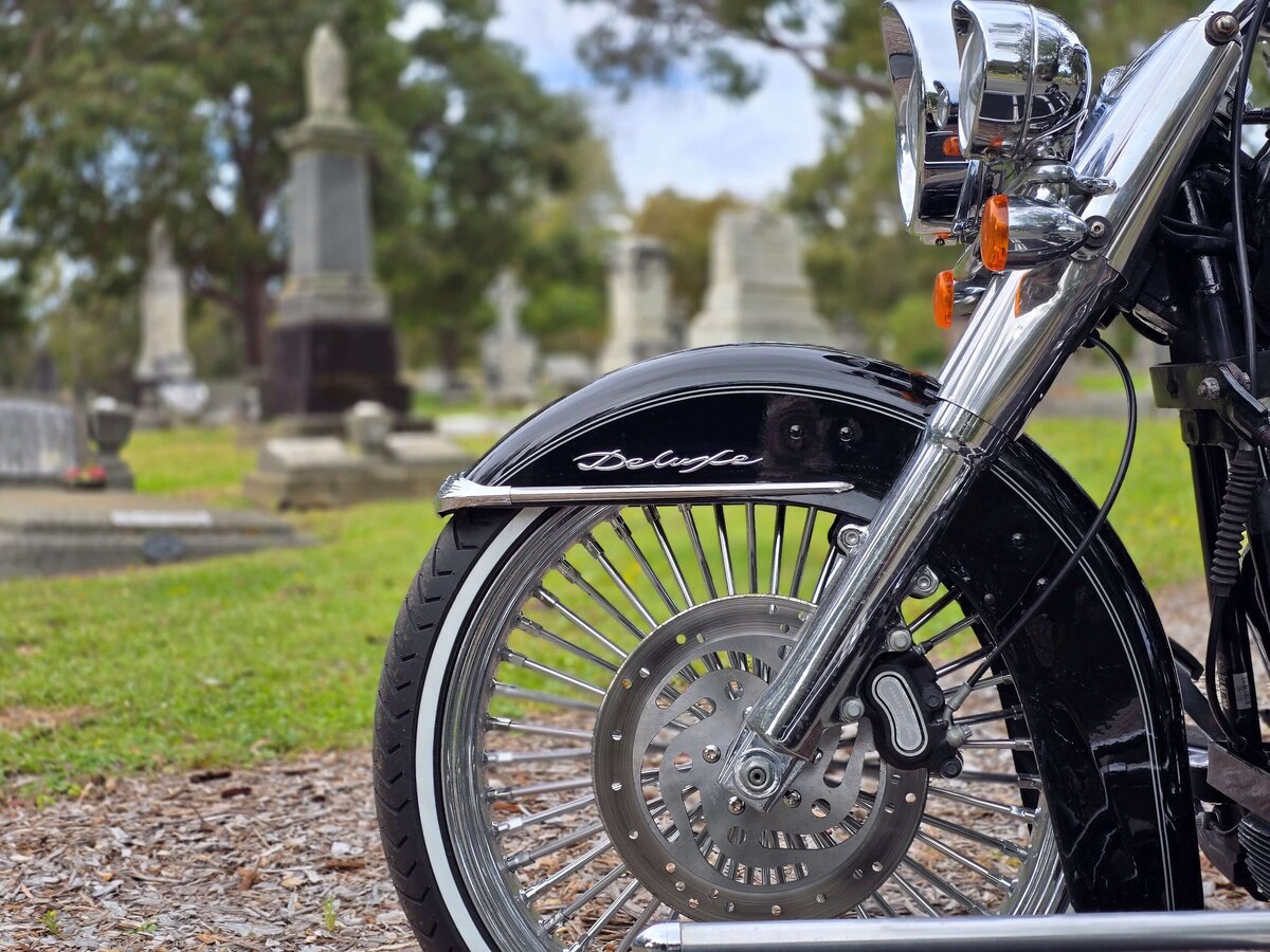 Close-up of Harley Davidson motorcycle hearse tyre, part of a distinctive funeral fleet in Perth.