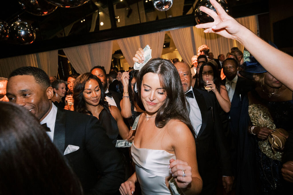 Bride dancing at the reception at the Theater on the Lake in Chicago.