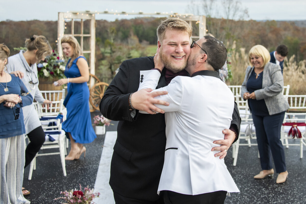 Gay couple hugging wedding photography Asheville, NC