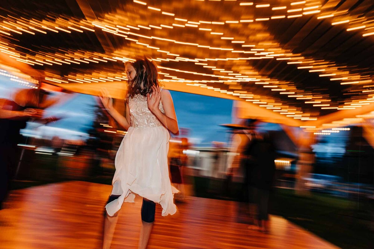 Wedding guest dancing at wedding reception, The Silver Knot, Ronan, MT