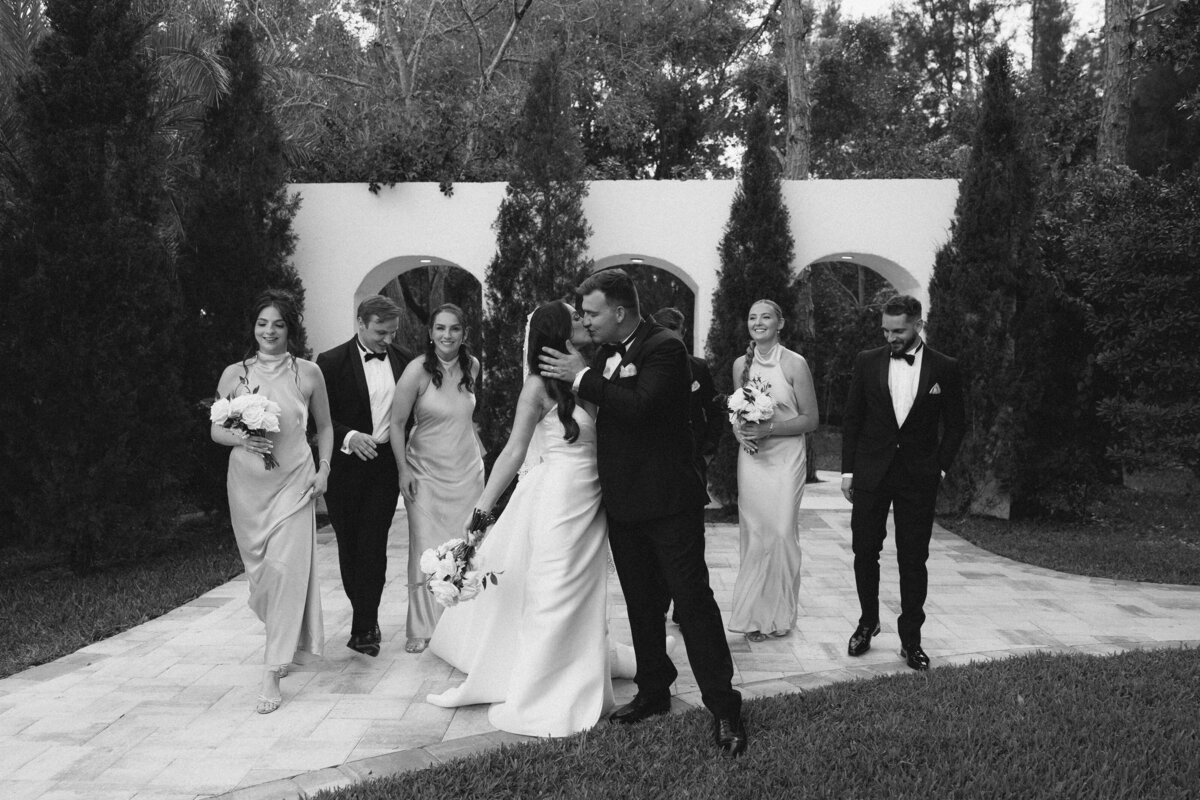 Bridal party portraits with Tuscan-style backdrop at La Casa Toscana