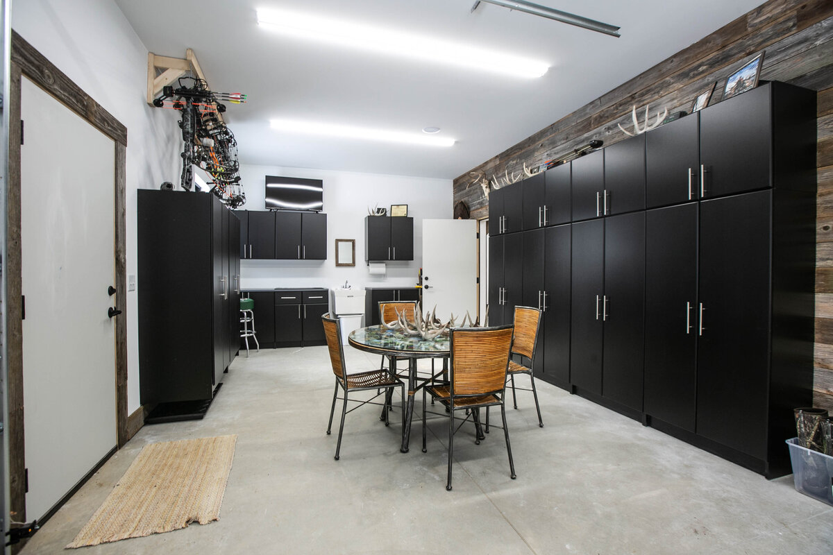 Finished garage with built in storage in Custom Elk River home