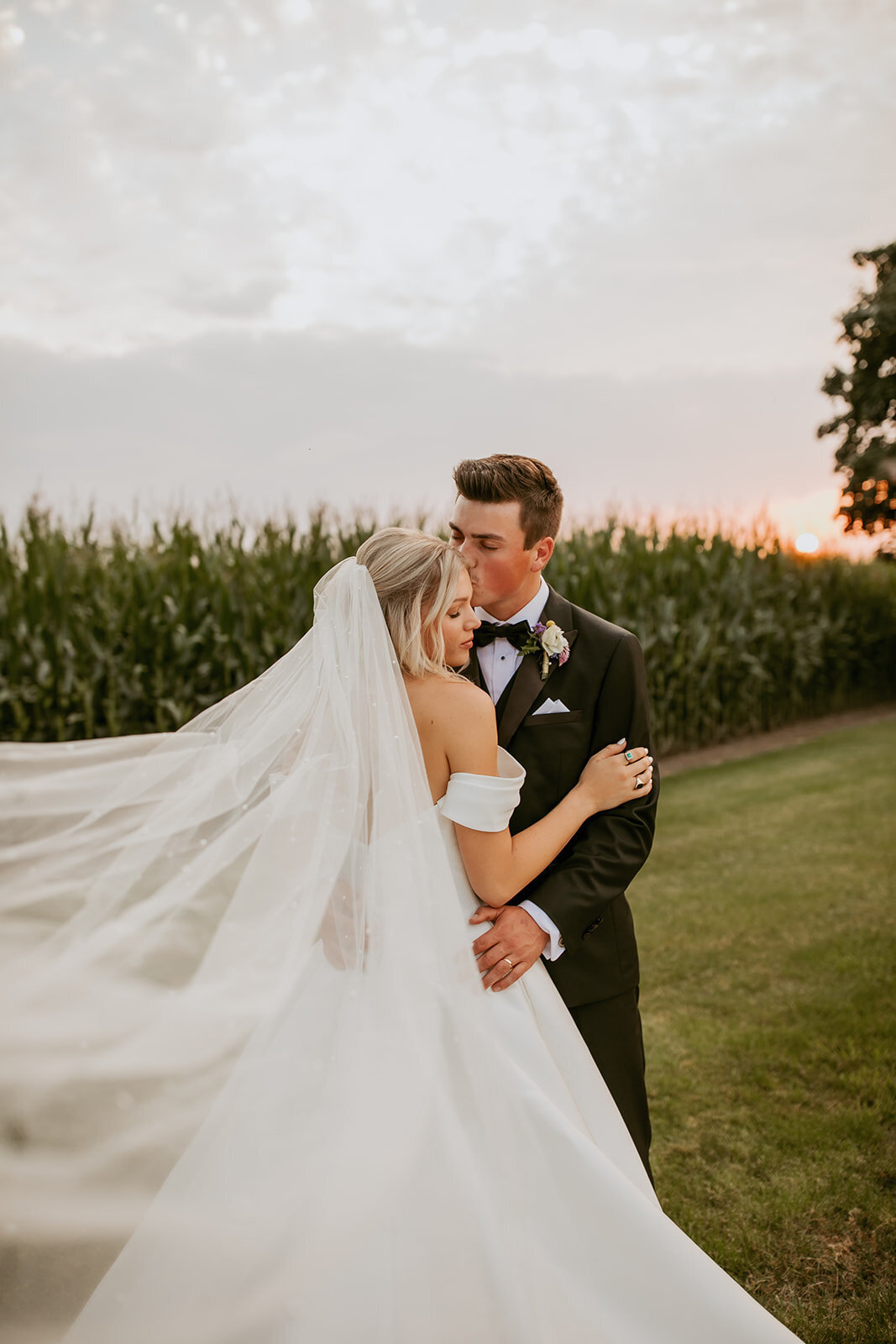 Bride and groom hugging after being married in Kitchener, Ontario.