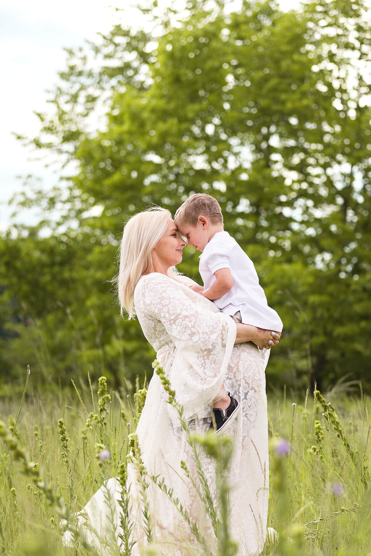 Mother and son moment during a maternity portrait session in New Ulm, Minnesota.