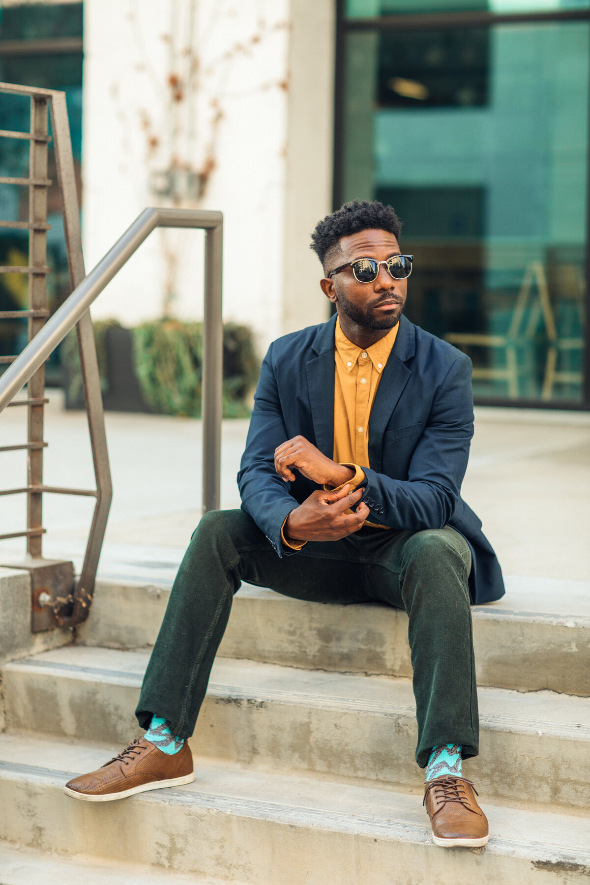 Portrait Photo Of Young Black Man Siting On Stairs Los Angeles