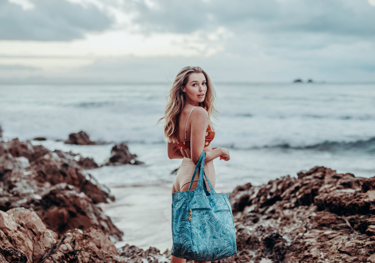 Avant-garde outfit against rocks