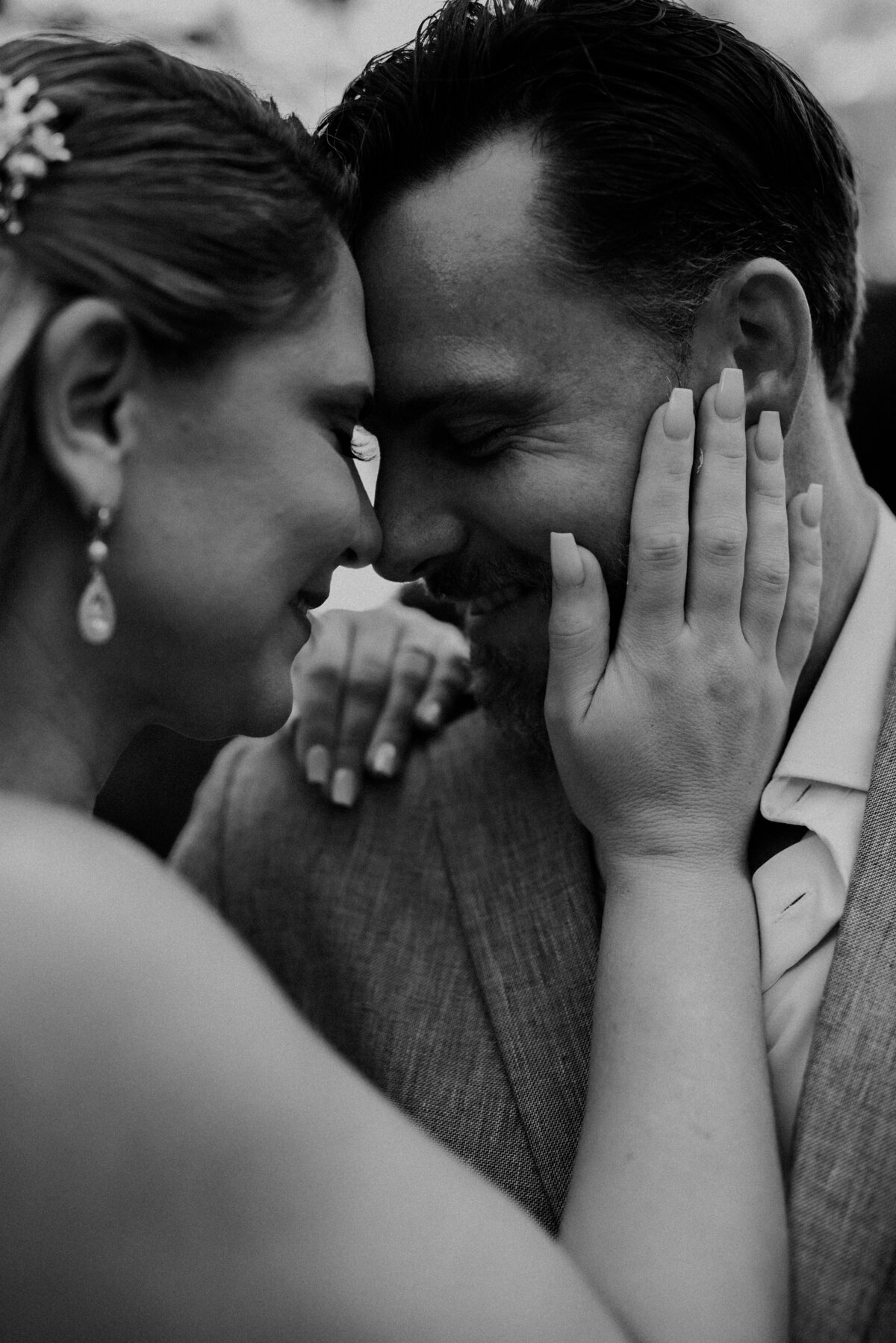 bride and groom embrace