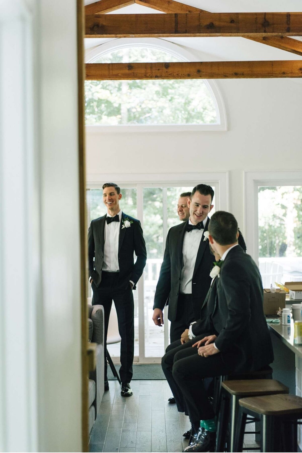Groomsmen get ready for a Luxury Michigan Lakefront Golf Club Wedding.