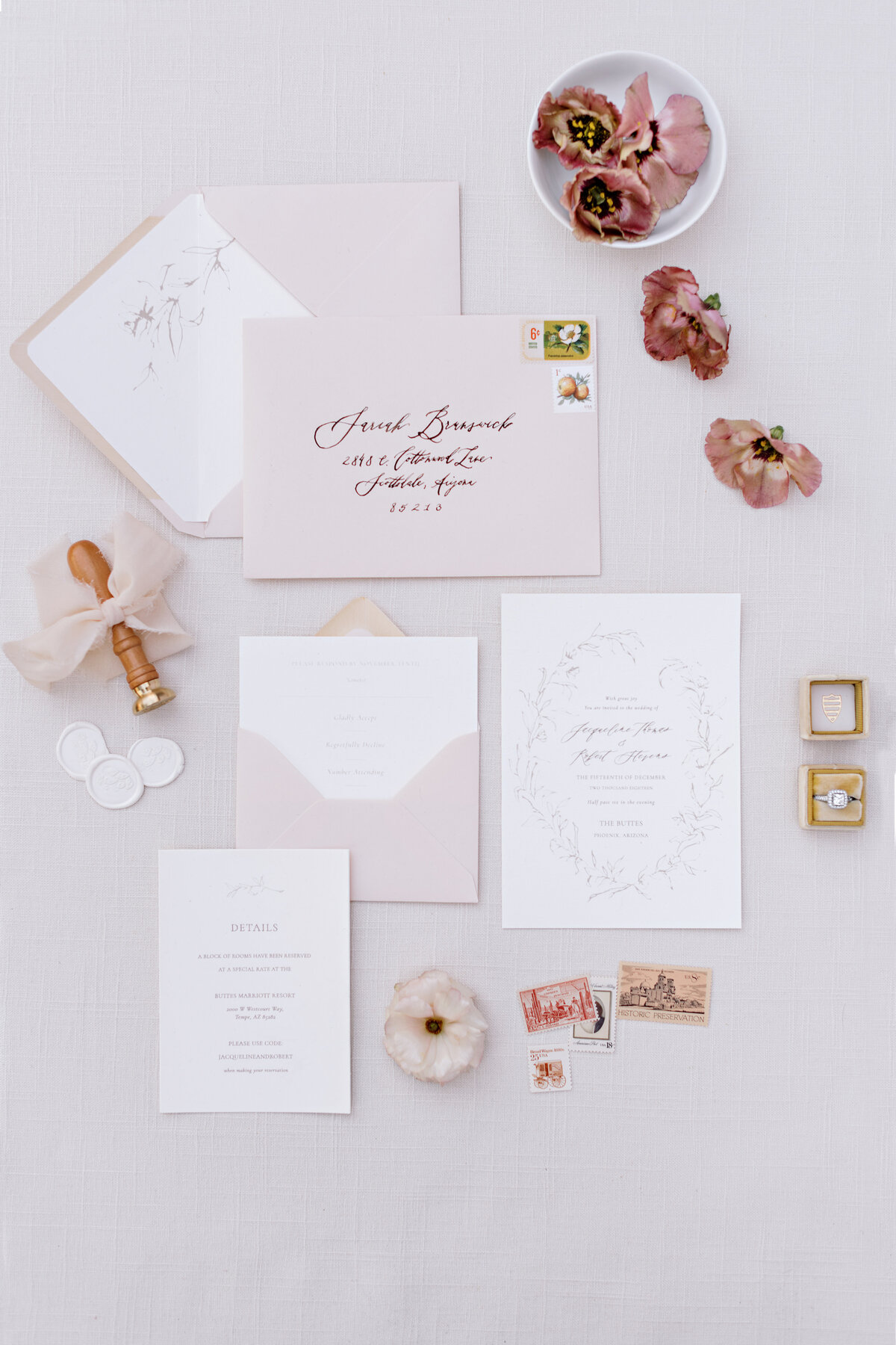 paper suite from an estate wedding in pink and mauve tones
