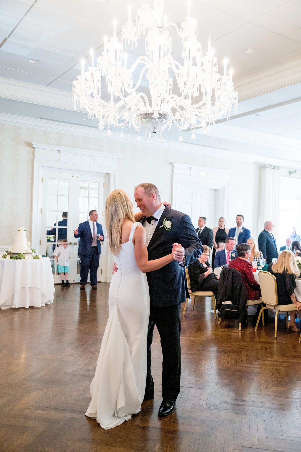 first dance couple inside of the ballroom at the pittsburgh field club