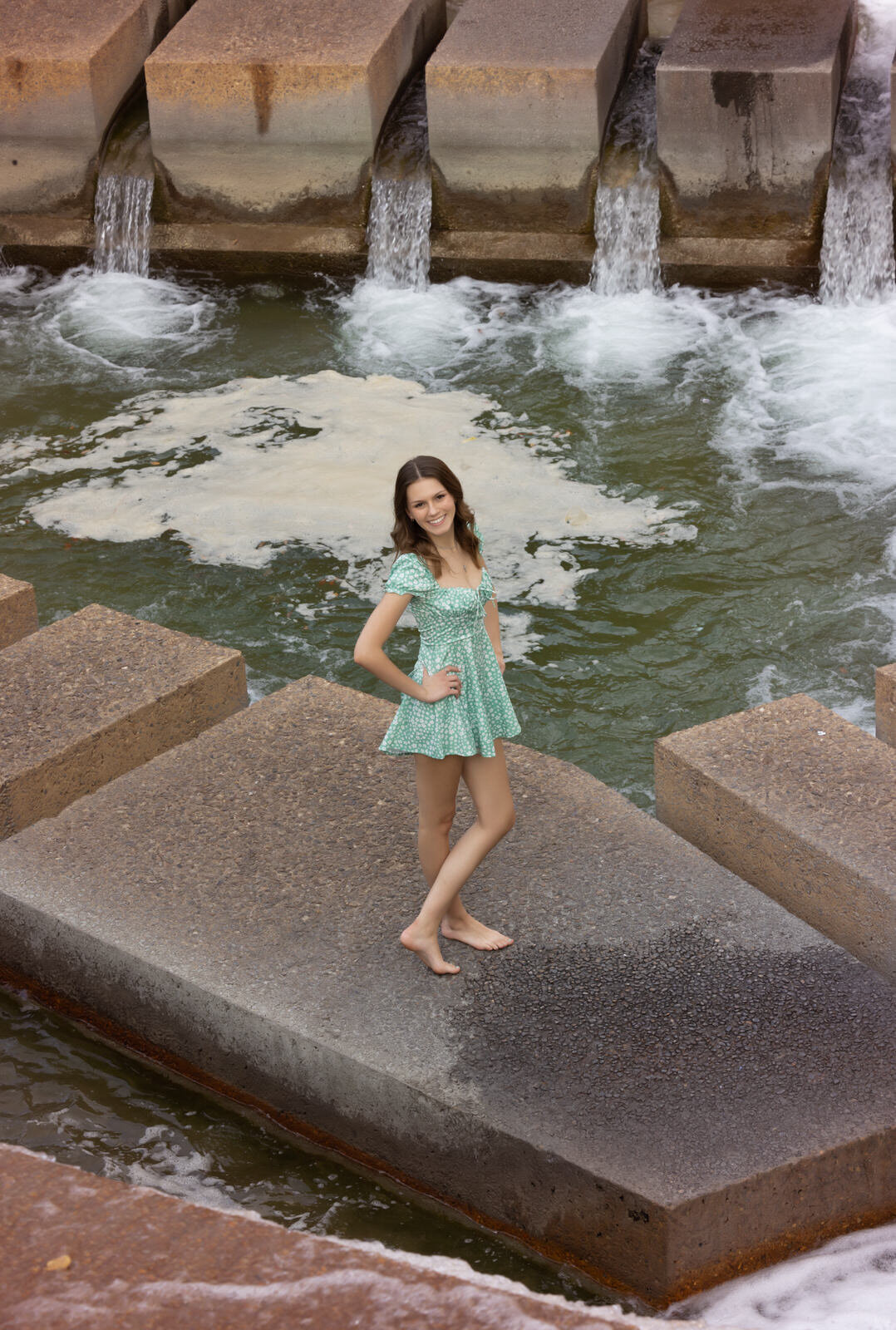 girl-standing-on-paver-in-fort-worth-water-gardens