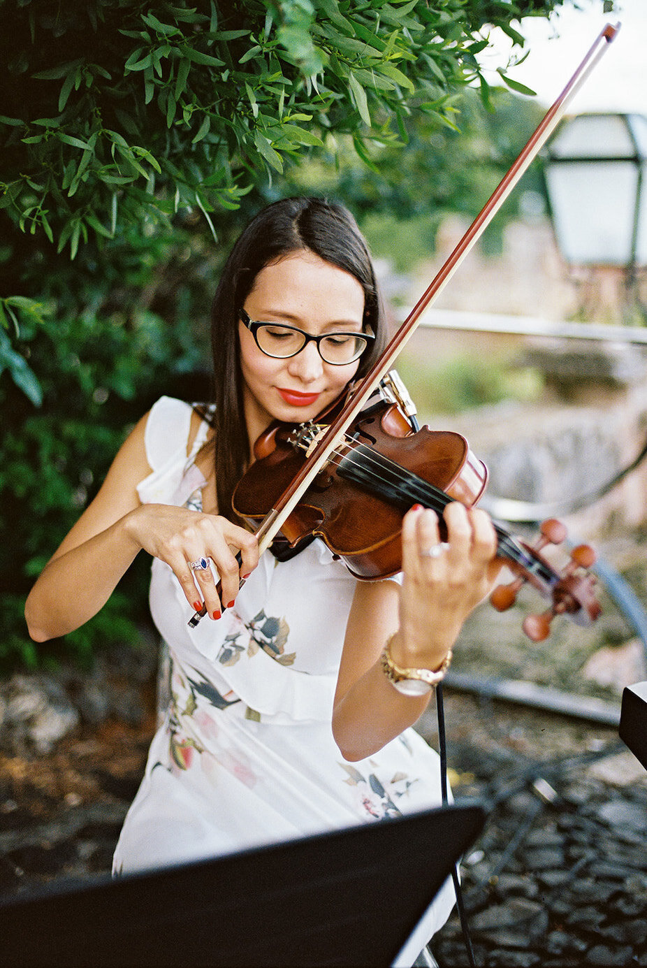 Live wedding violinist at a outdoor destination wedding
