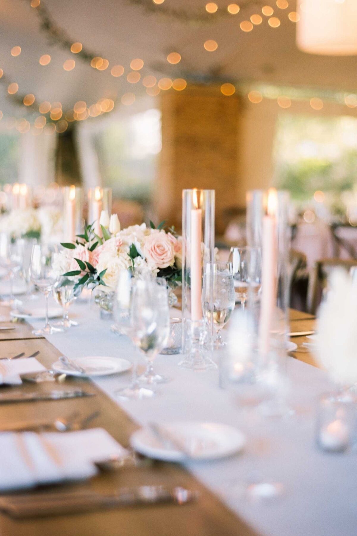 Romantic Pink and White Wedding Reception Table Design on Farm Tables at Luxury Chicago North Shore Garden Wedding Venue