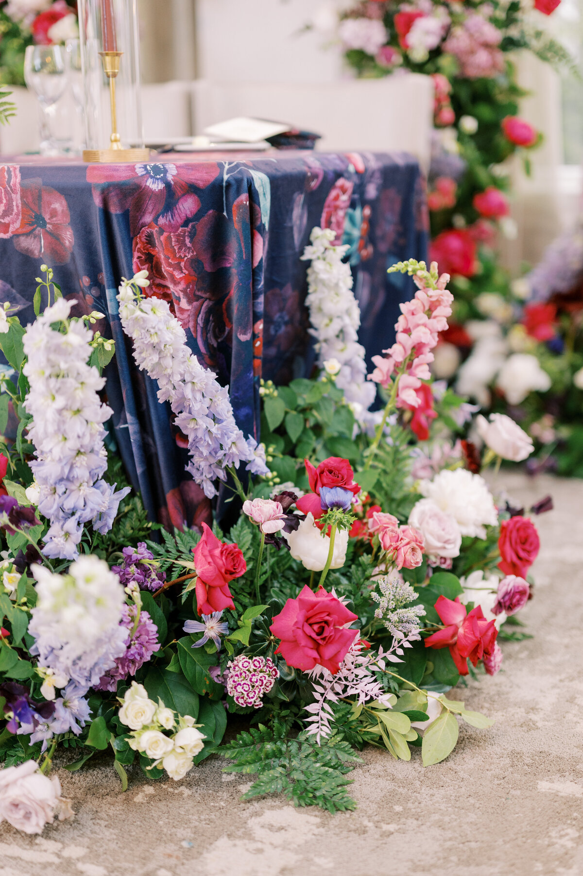 Vibrant floral palette and ceremony decor at a colorful wedding at Château Grande NJ

