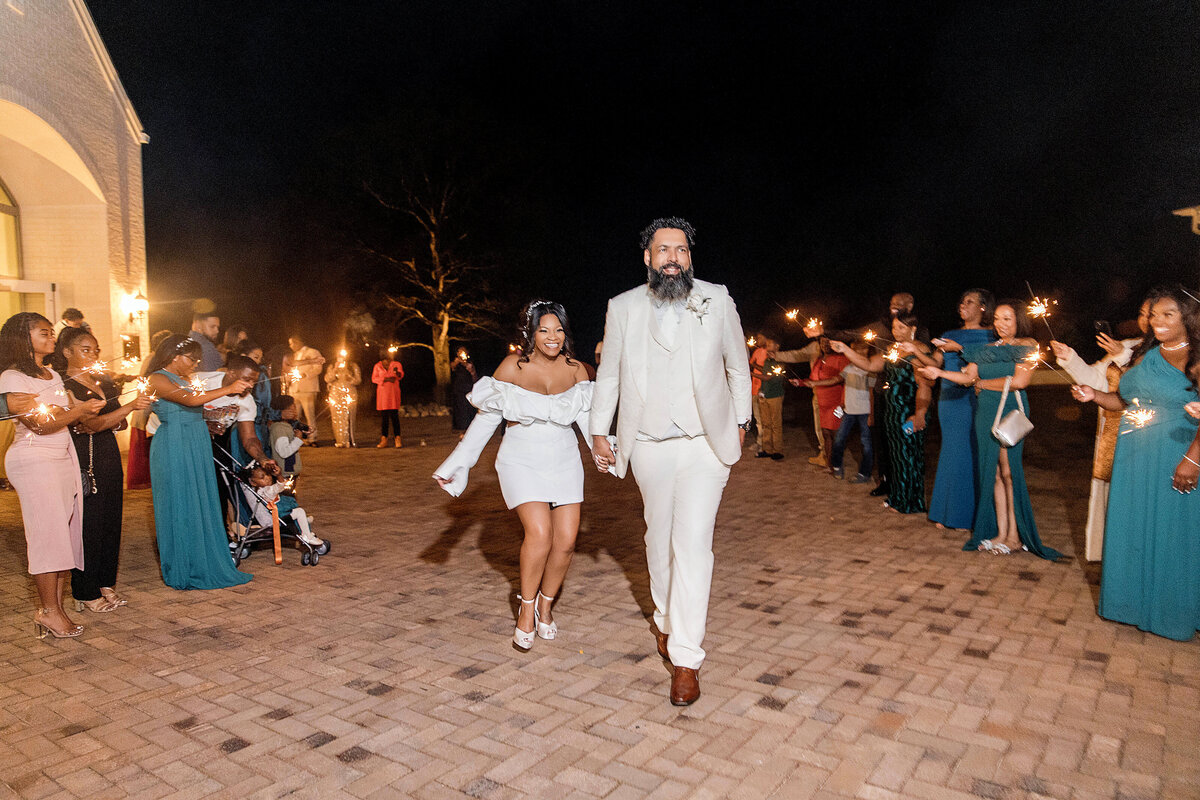 The newlyweds celebrate with guests in a lively, fun-filled wedding procession.