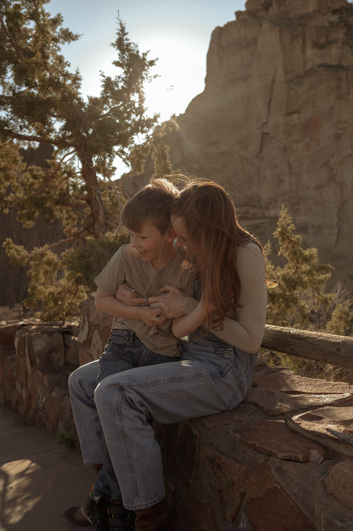 mother and son enjoying a sweet moment together at Smith Rock State Park