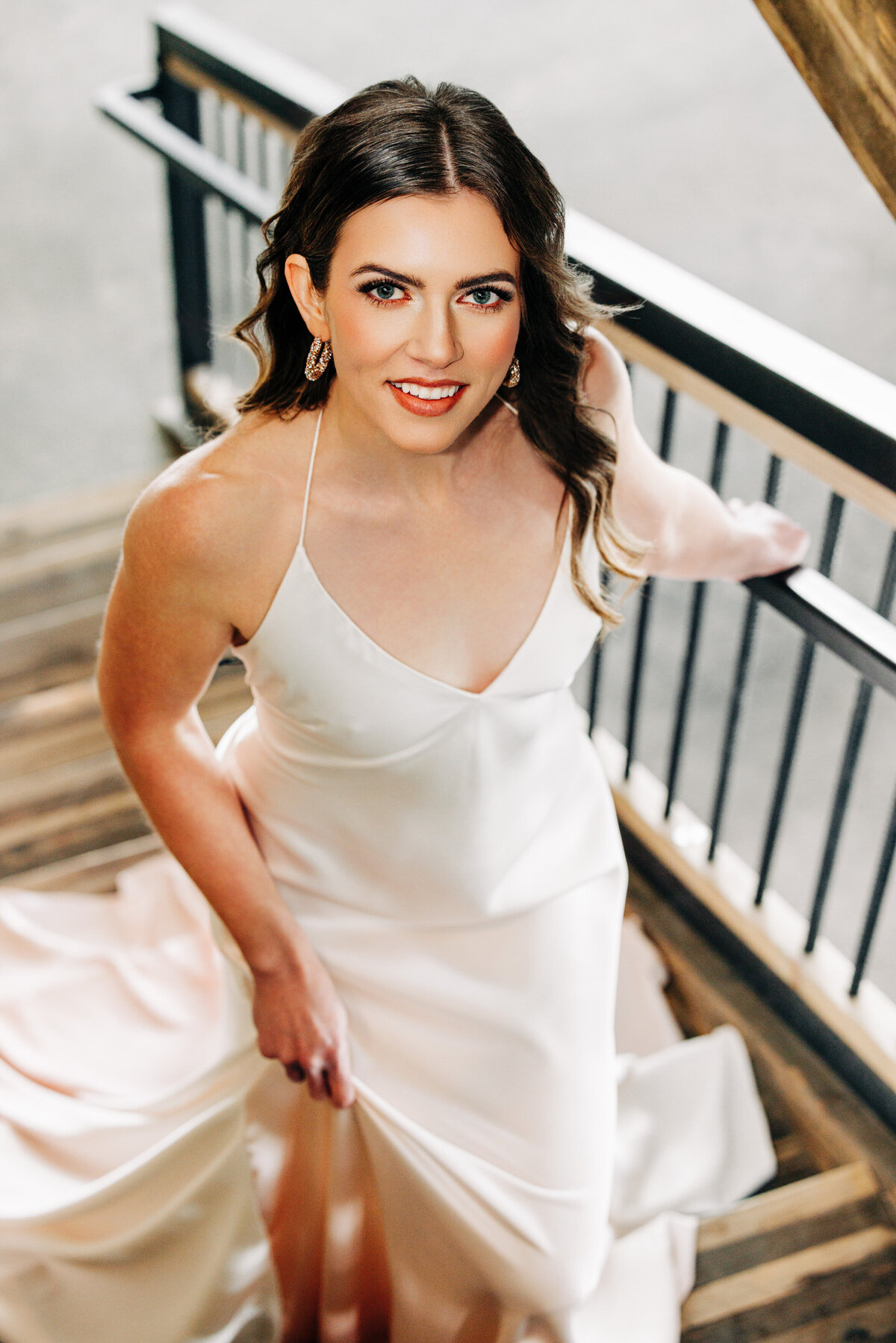 Bride walking up stairs at Fox Fields in Red Lodge, MT