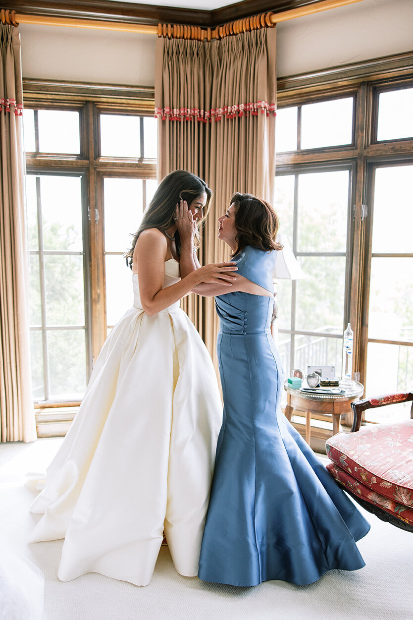 Bride and her mom getting ready by Sarah Bradshaw