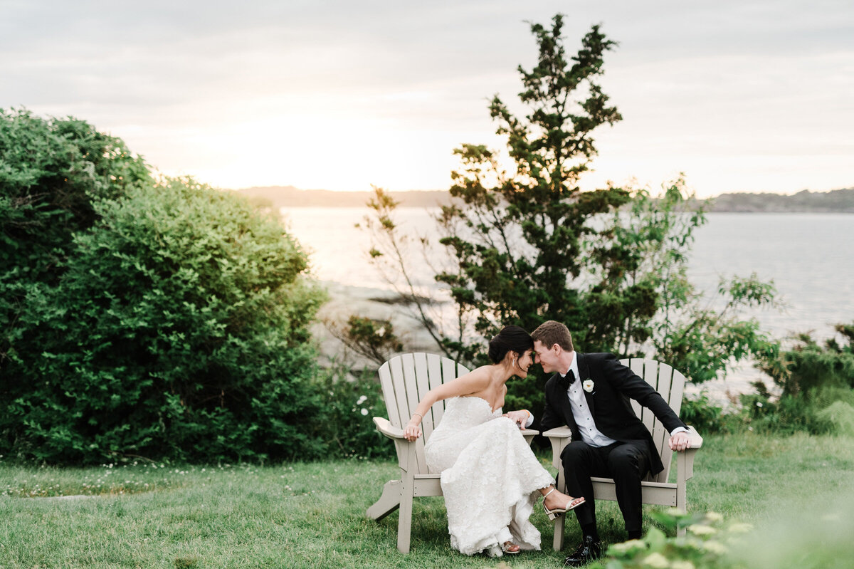 Kate-Murtaugh-Events-Newport-RI-Castle-Hill-Inn-dinner-bride-groom-sunset-kiss-wedding-planner