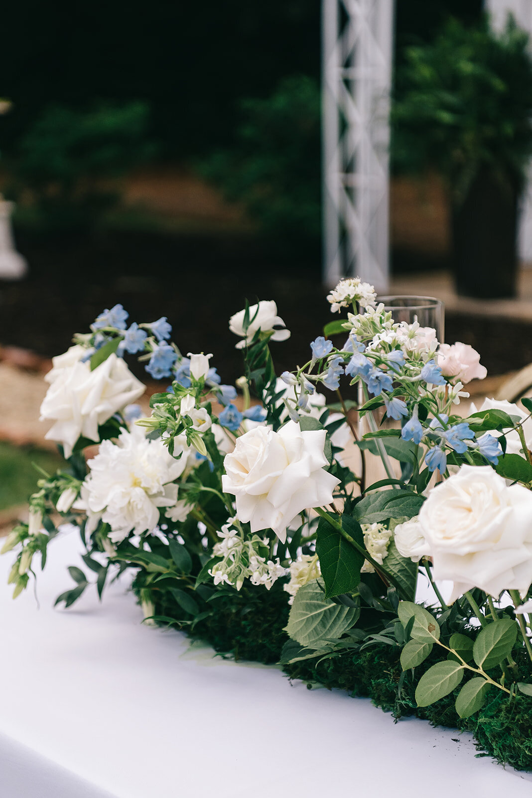 White and blue floral centerpieces designed by Abby Grace Florals at Greenville SC wedding