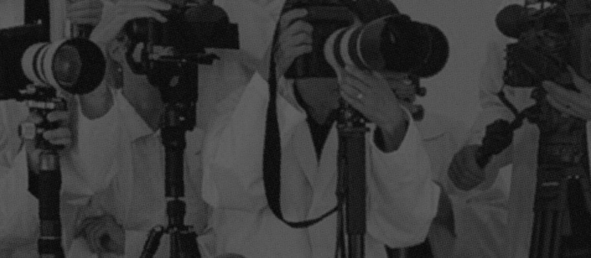 Numerous cameras all capturing the same frame at an event in a studio rental space in Chicago. 