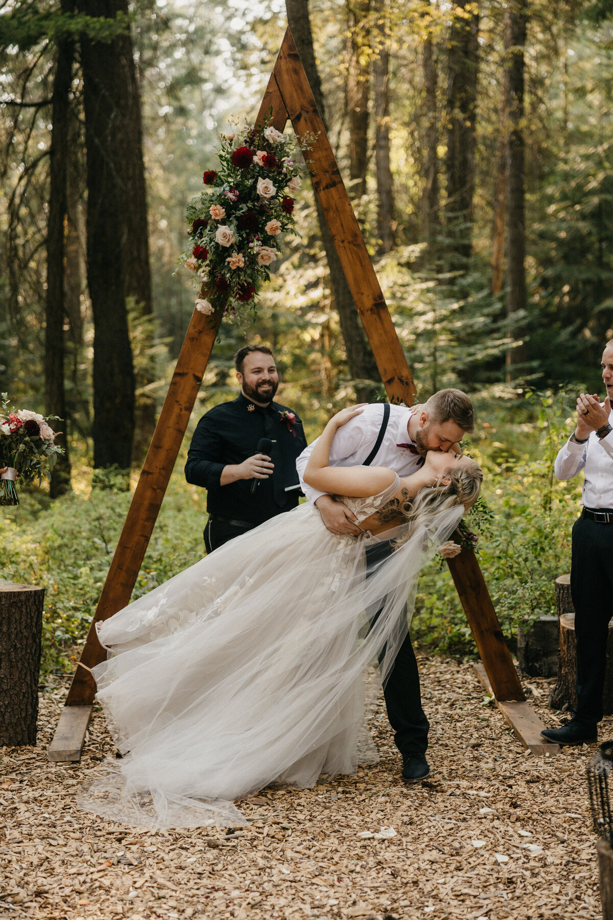 bride and groom first kiss