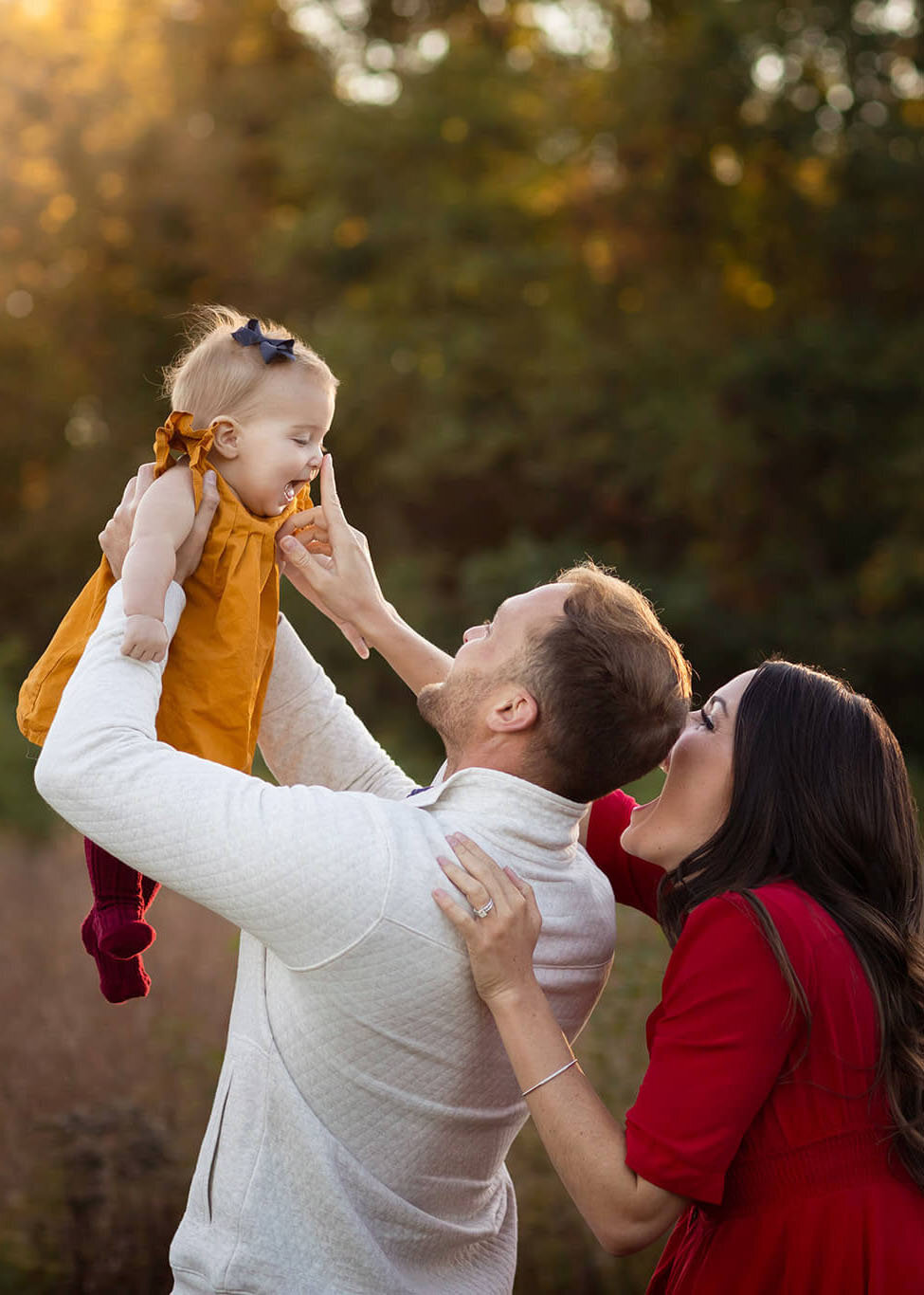NJ Portrait Photographer captures parents touching baby's nose in Chester NJ