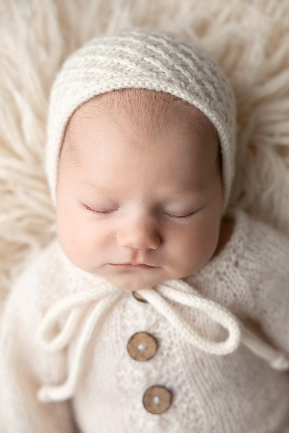 Newborn baby girl in pink Edmonton studio photography 