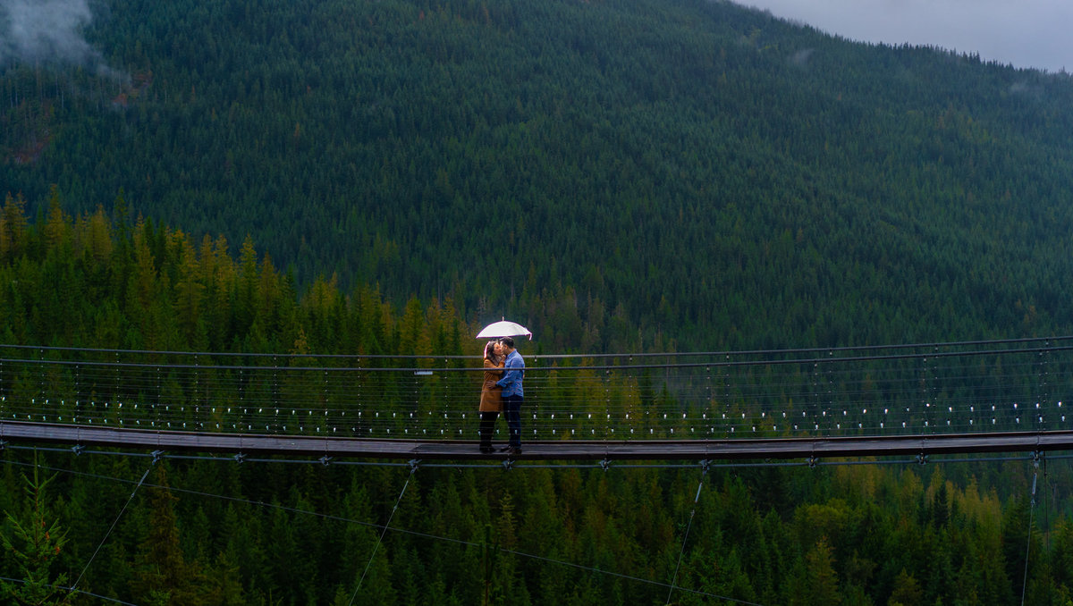 Couple in a rainy Sea to Sky engagement session