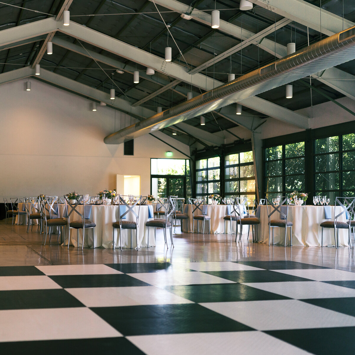 clayton-house-reception-white-tableclothes-checkered-dancefloor