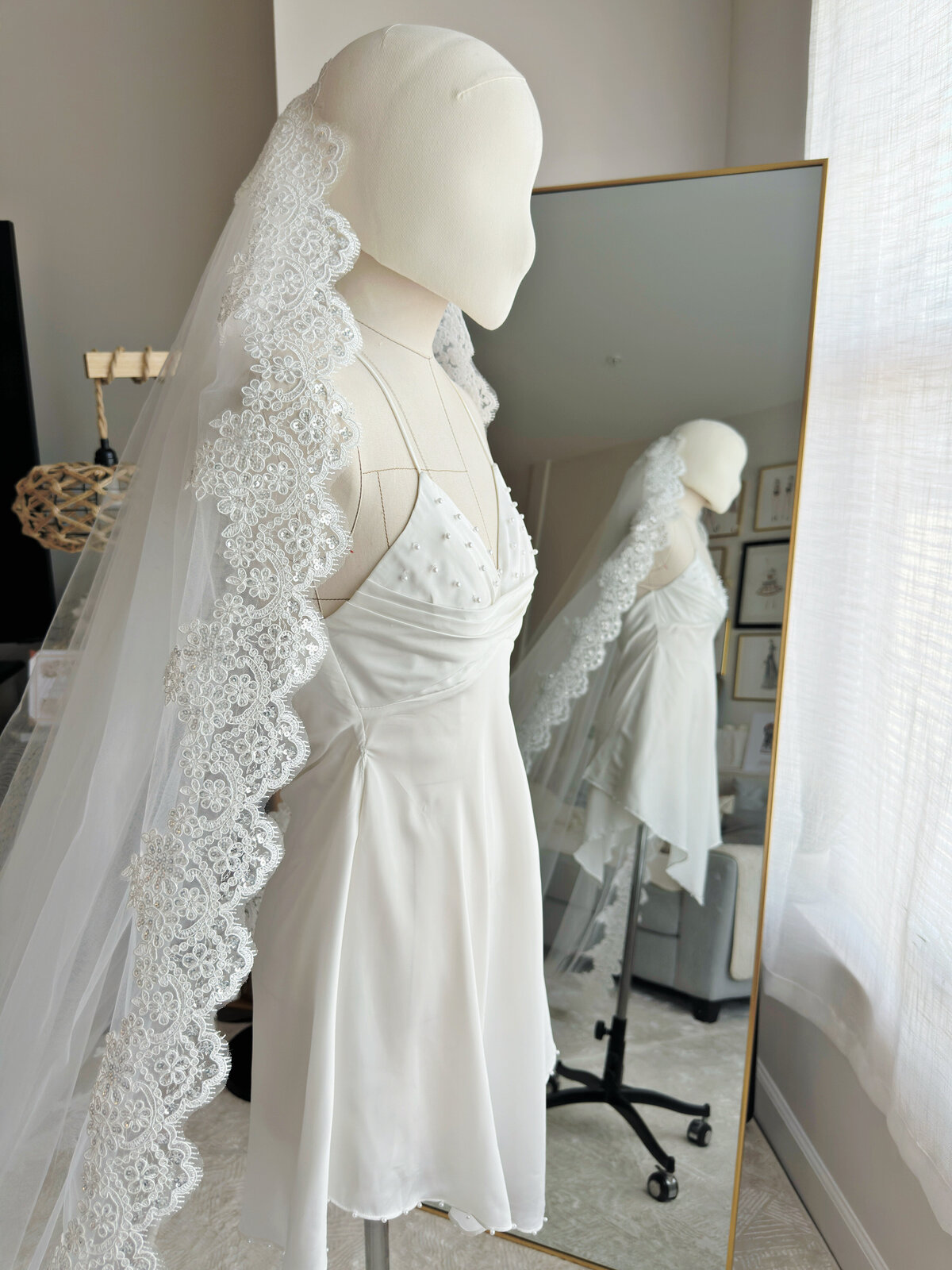 Fine lace mantilla bridal veil with scalloped edge and sheer body