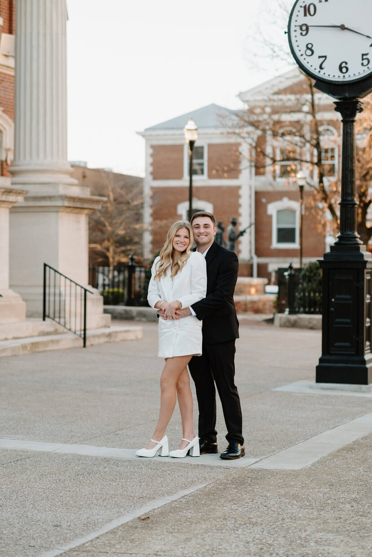 couple embracing by nashville engagement photographers