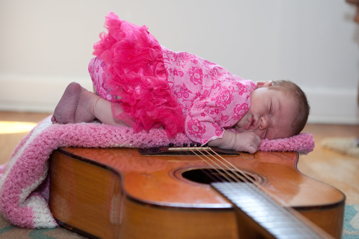 baby portrait on guitar
