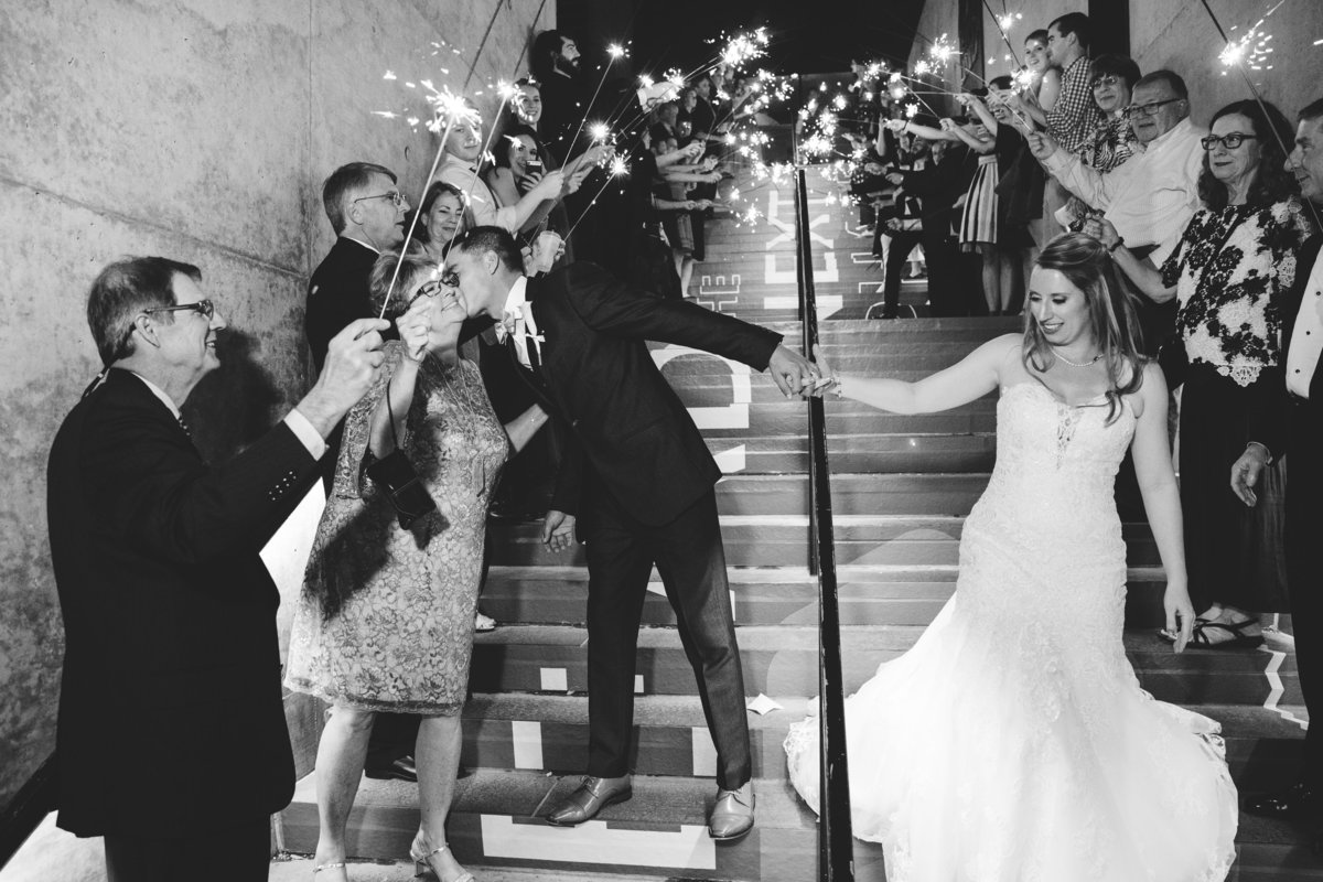 w austin hotel wedding photographer groom kisses mother 200 Lavaca St, Austin, TX 78701