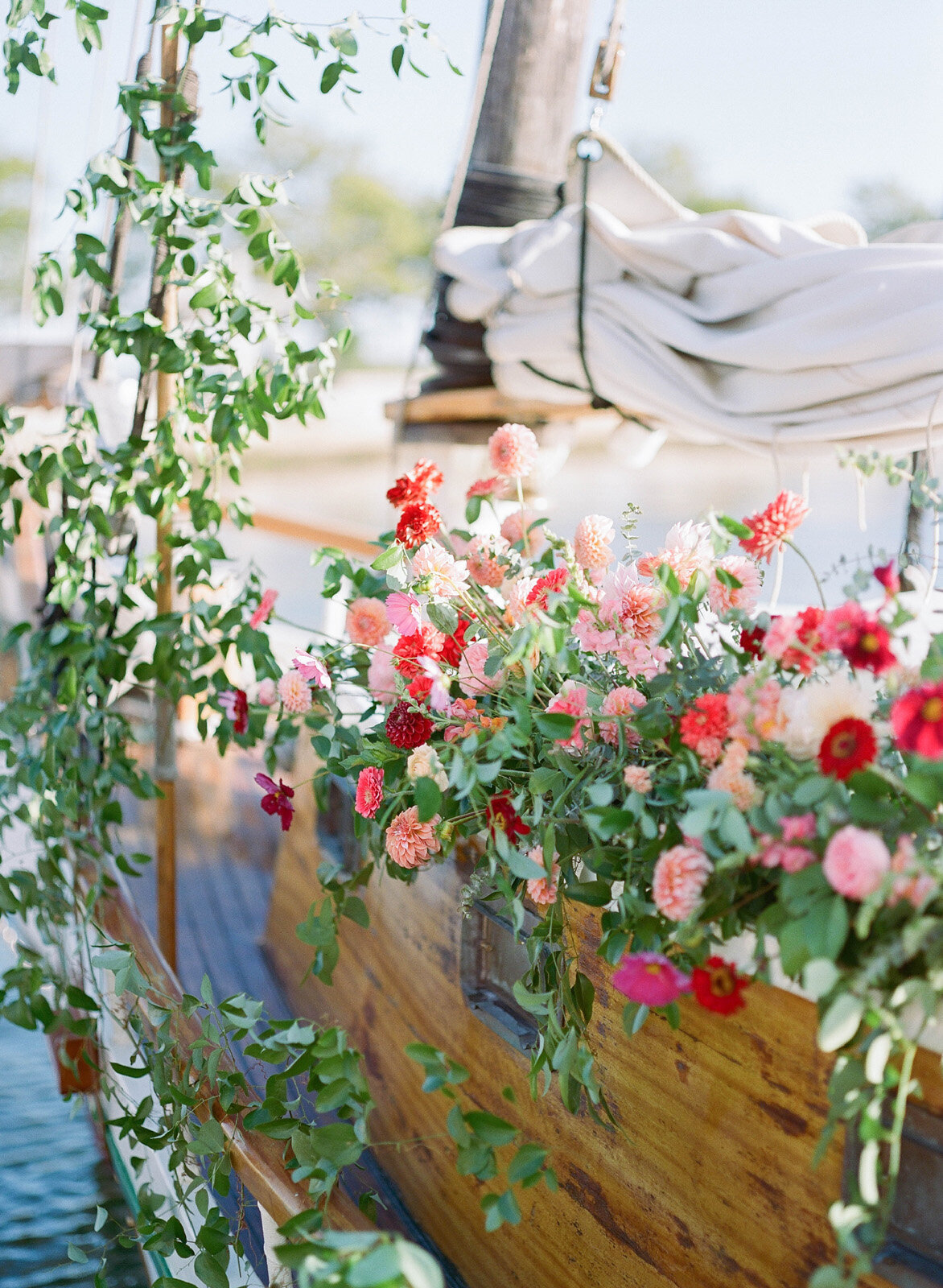 Kate-Murtaugh-Events-elopement-wedding-planner-Boston-Harbor-sailing-sail-boat-yacht-greenery-floral-installation-dahlia