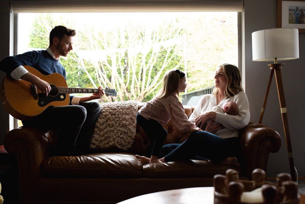 Indoor family photoshoot outfit ideas neutral with blue denim