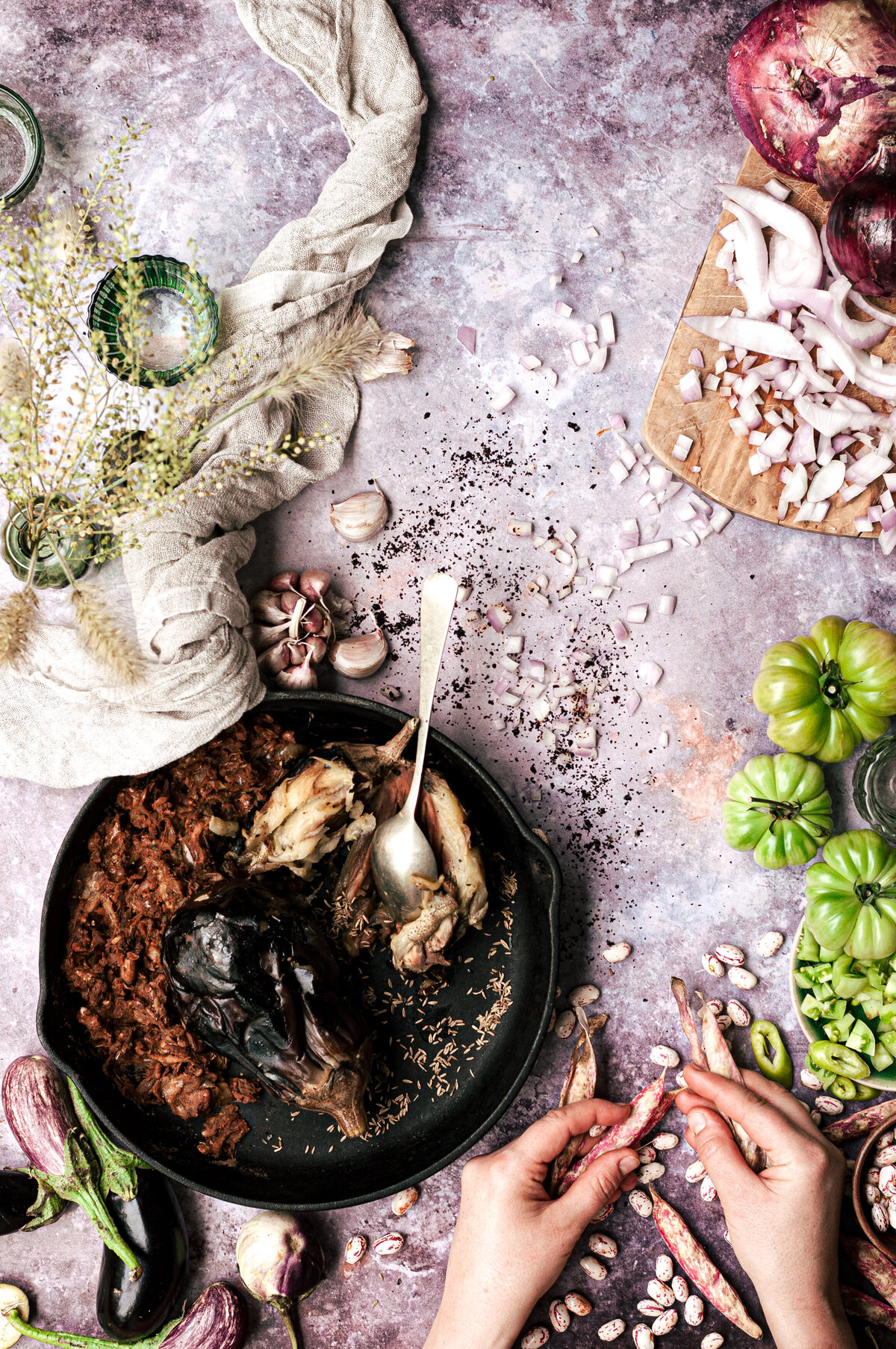 aubergine-taco-prep-process-flatlay-hands-in-frame