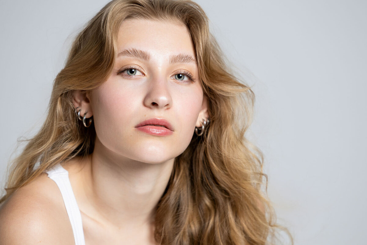 Detail photo of senior girl taken in studio with white background in Utah.