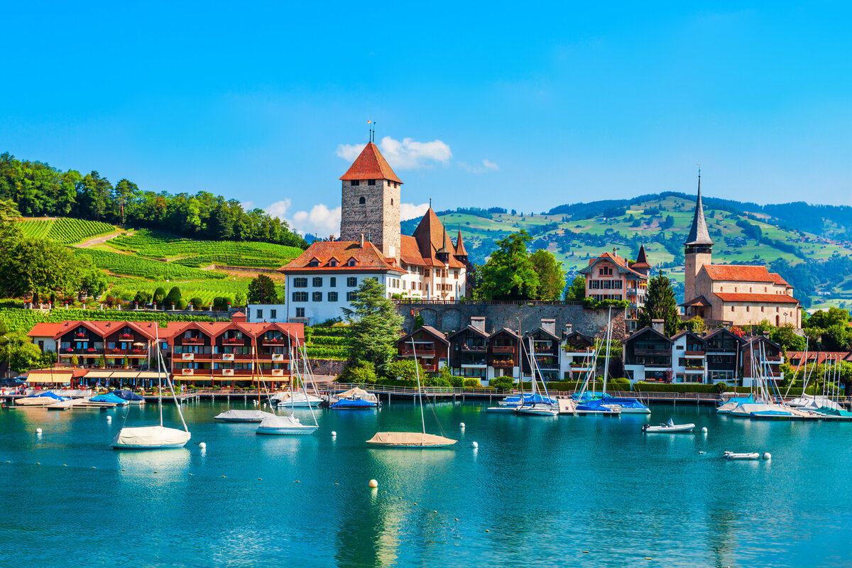 Waterstone - Travelive - Switzerland - Luxury Destination Management Company - Spiez Castle or Schloss Spiez and Schlosskirche Church near Thun la