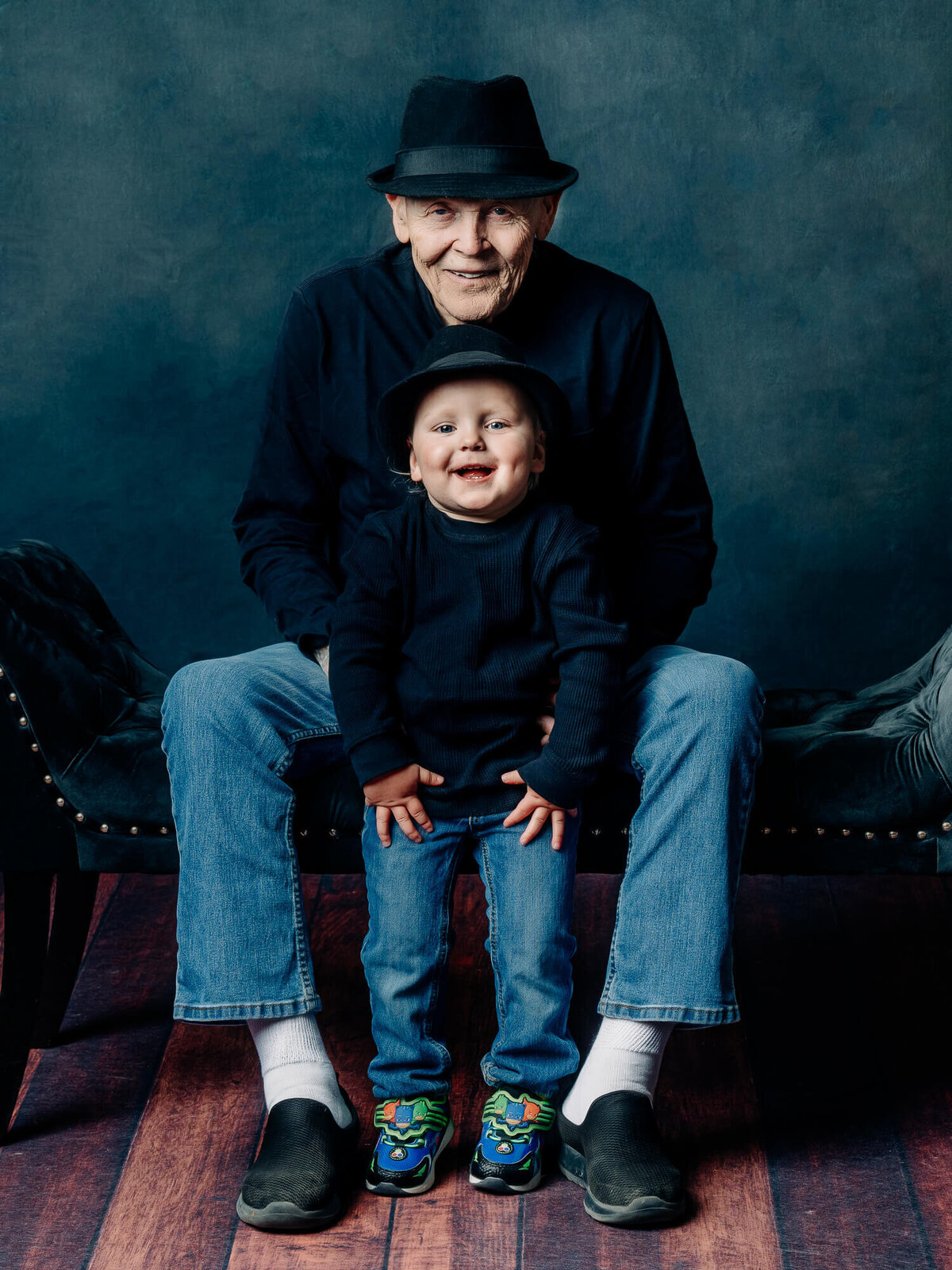 Grandaddy and grandson pose in studio for Prescott family photographer Melissa Byrne