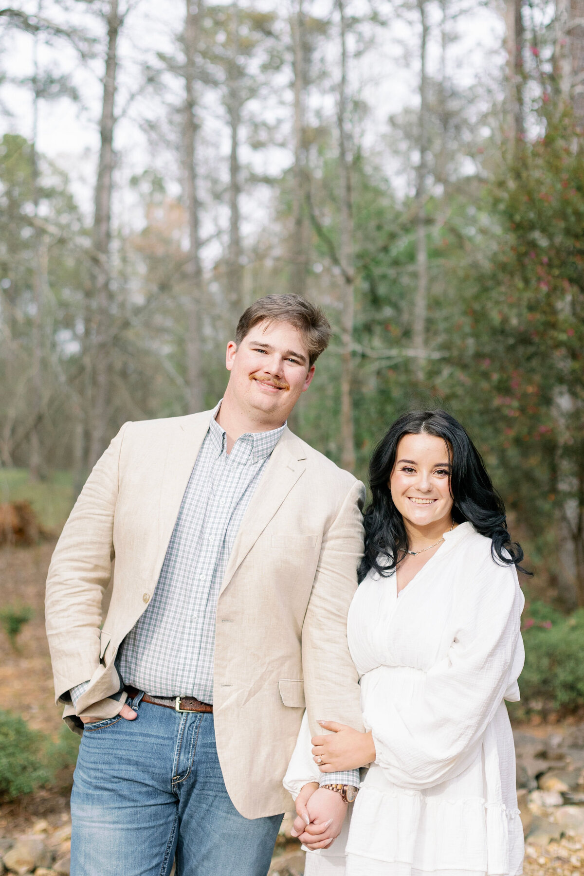 Couple holding hands and smiling