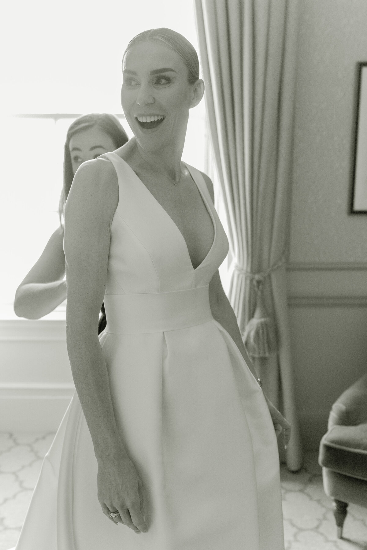 Happy bride on the morning of her Gleneagles wedding day. Image by fine art wedding photographer, Jill Cherry Porter.