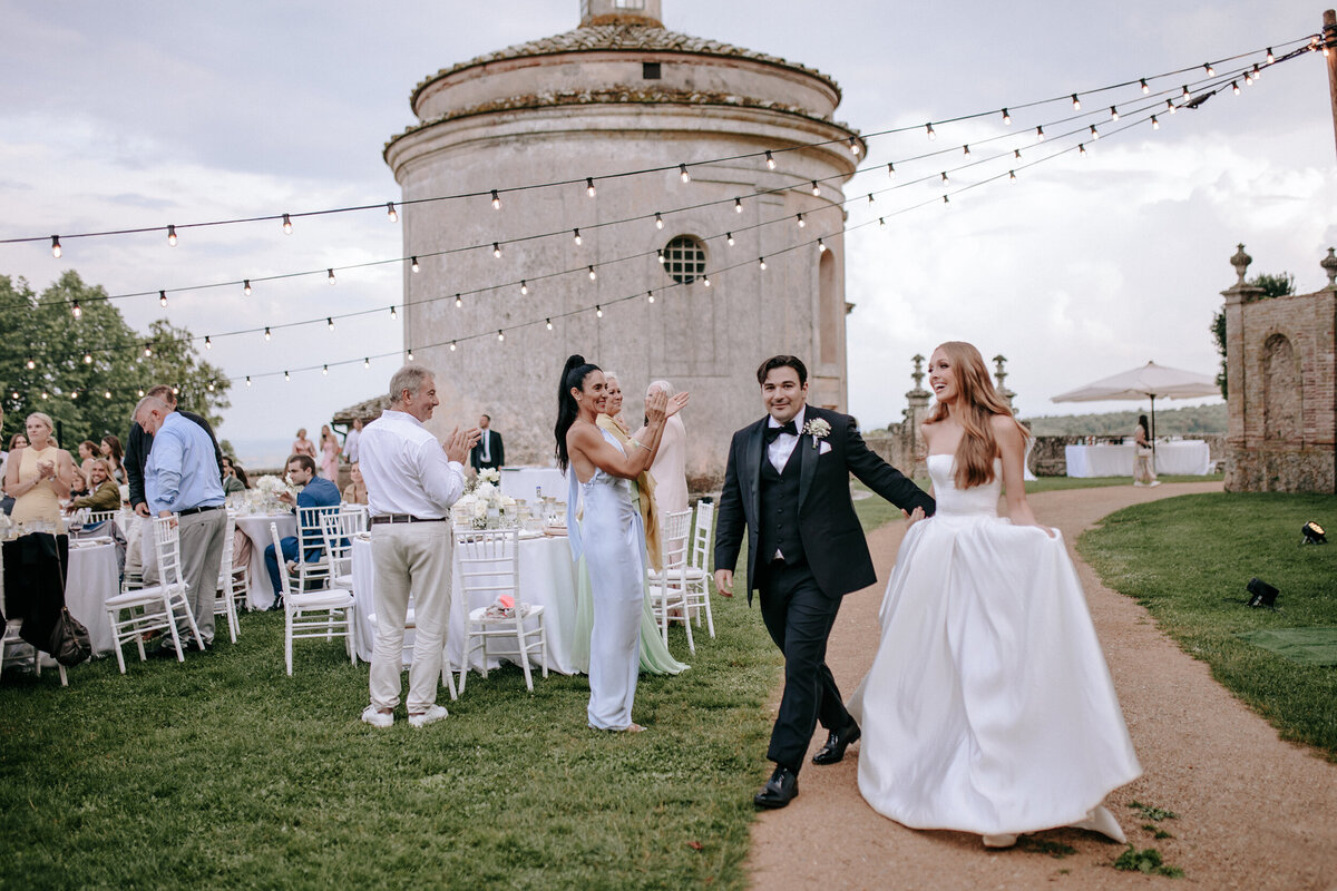 Bride and Groon grand entrance to reception in Italy