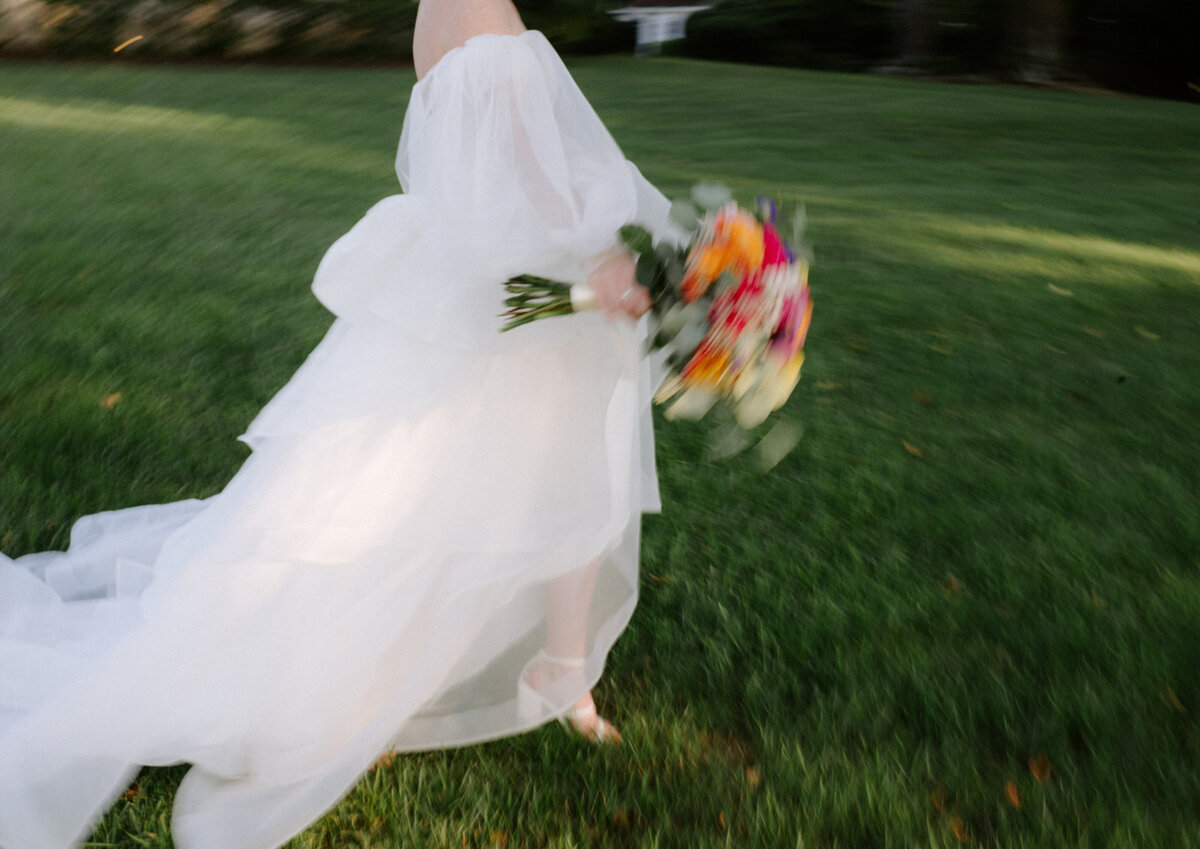 Colorado bride running in wedding dress