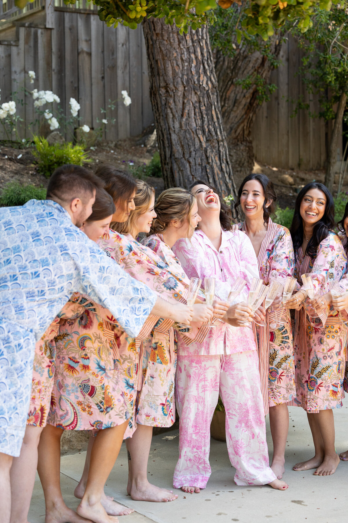 Bridesmaids toasting with a bride